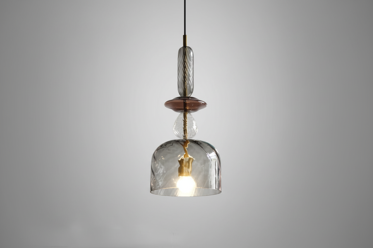 Clear glass pendant light with wooden accent on a gray background