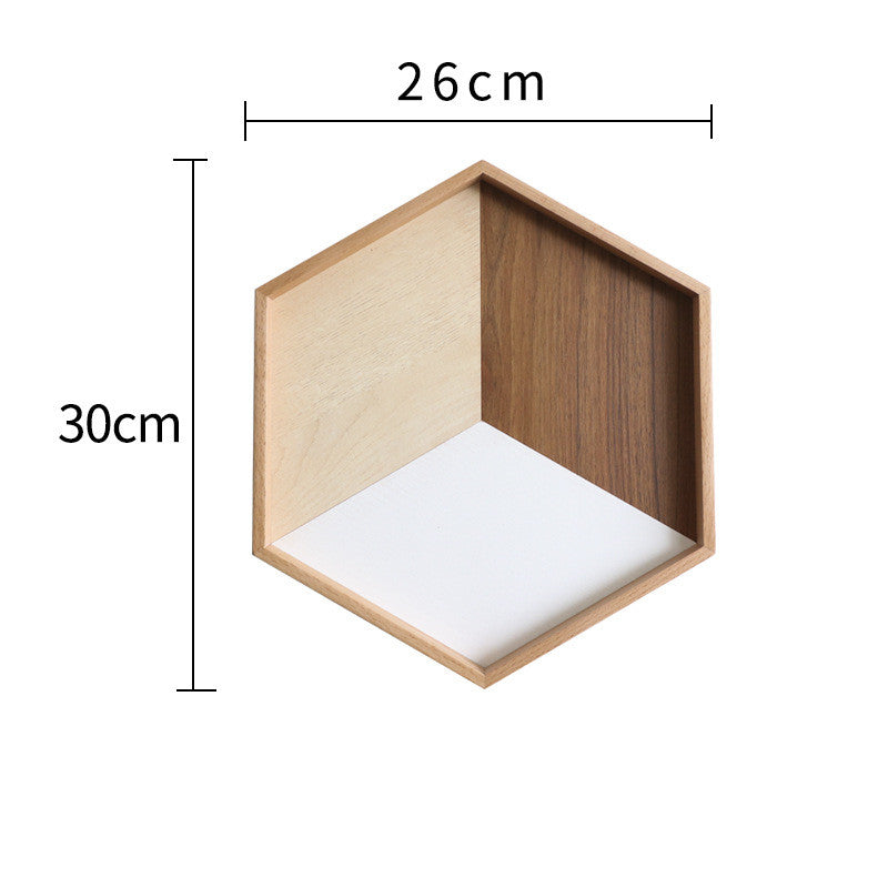 Hexagonal wooden shelf with dimensions labeled on a white background