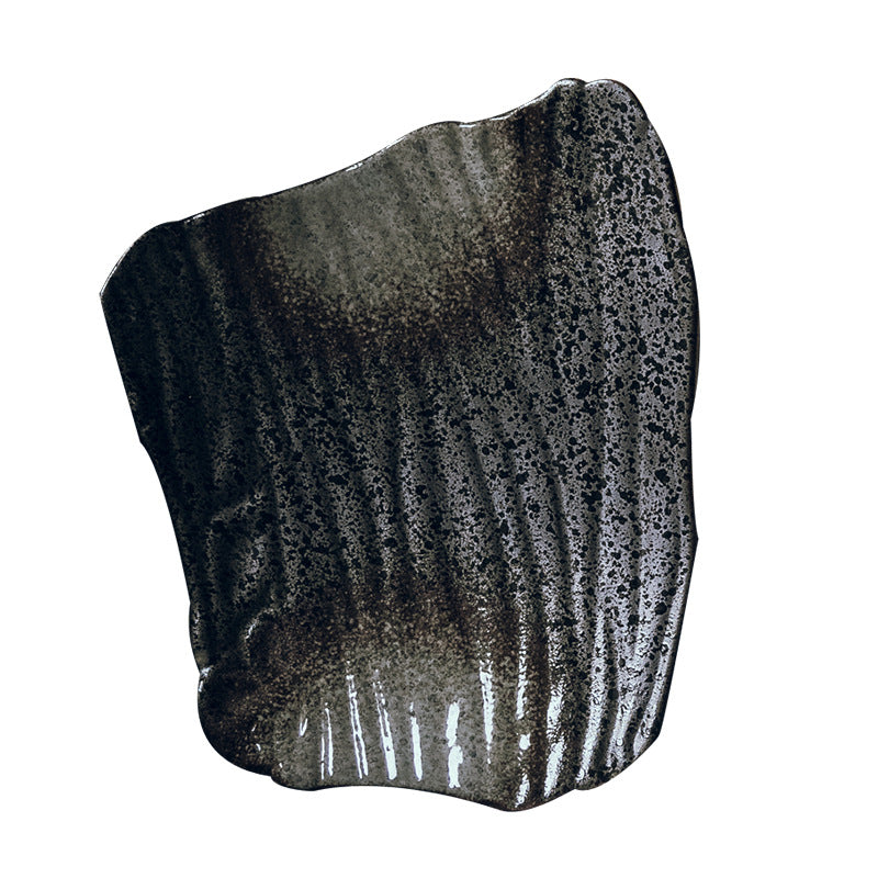 Black and gray textured stone on a white background