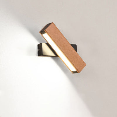 Modern wall-mounted light fixture with wooden finish on a white background