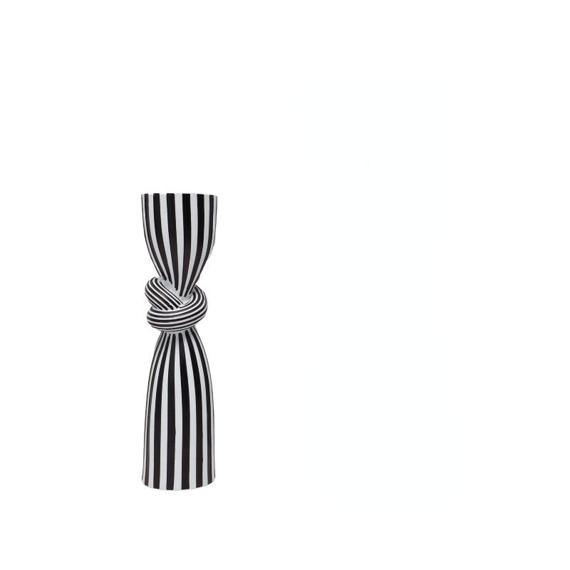 Black and white striped tie on a white background