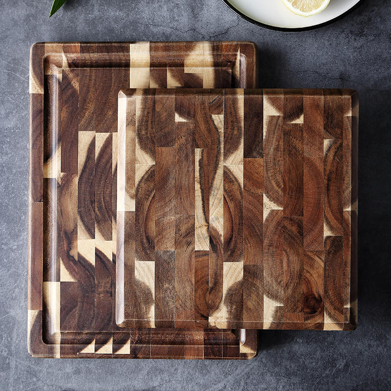 Wooden cutting board with geometric pattern on a dark surface