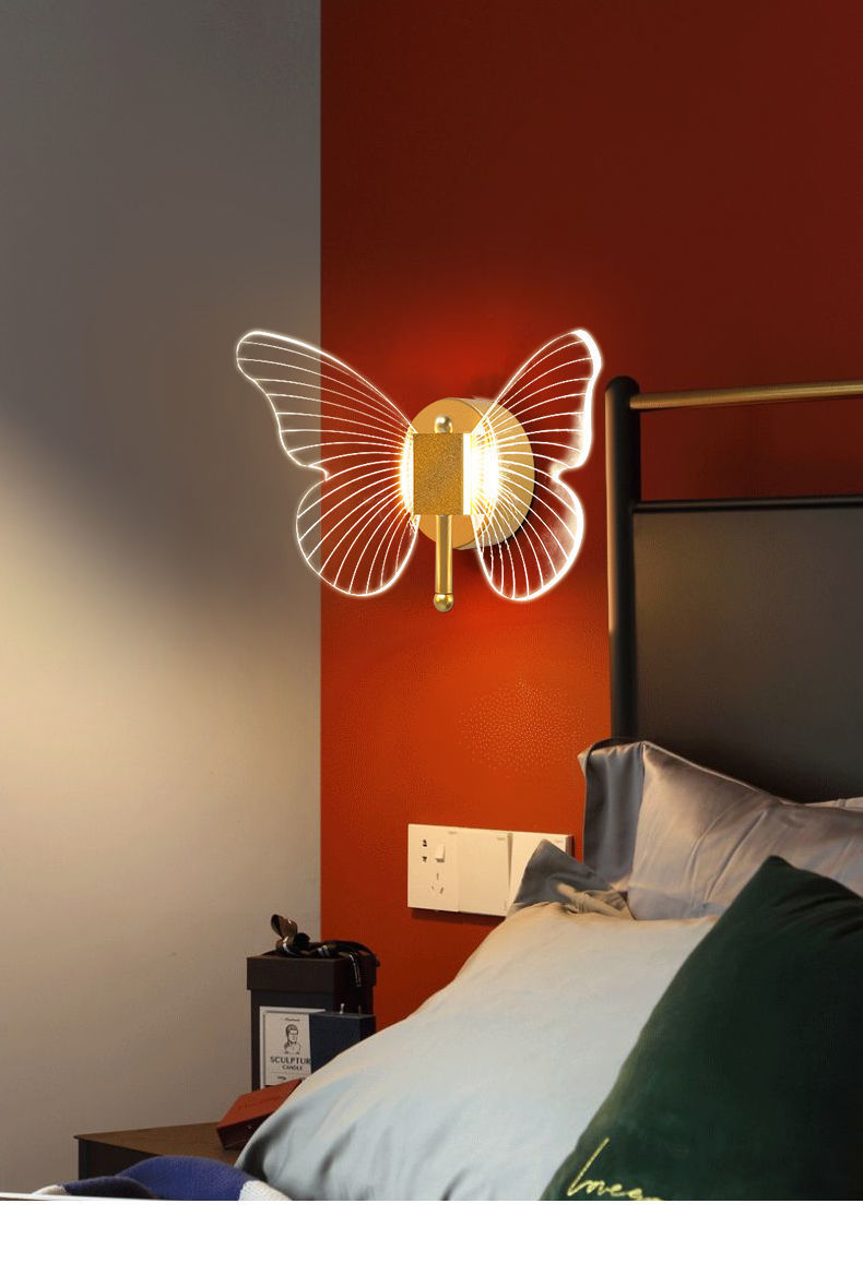 Decorative butterfly wall light fixture in a bedroom setting.