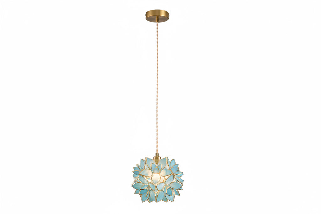 Decorative pendant light with floral design on a white background