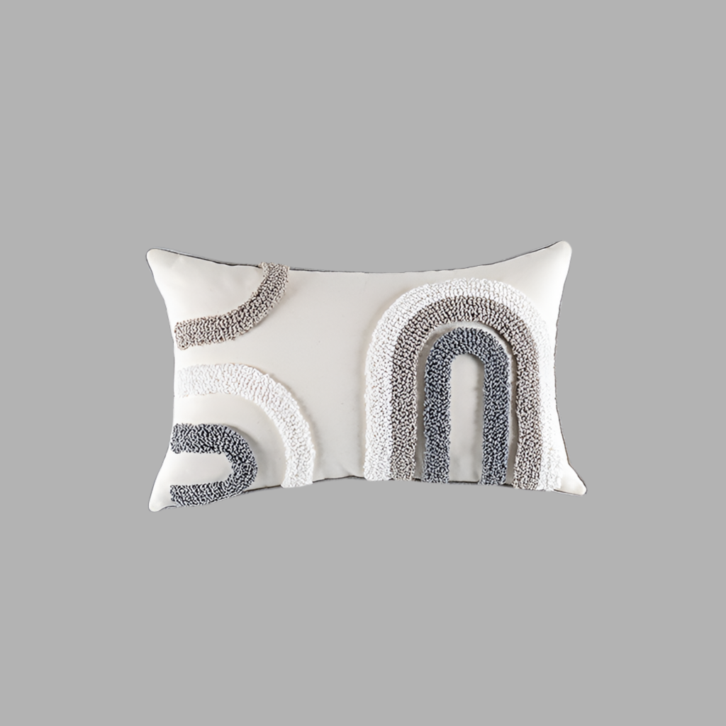 Decorative pillow with geometric pattern on a gray background