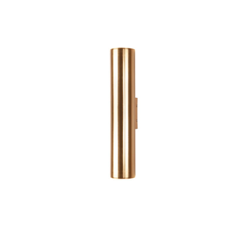 Gold cylindrical object on a white background