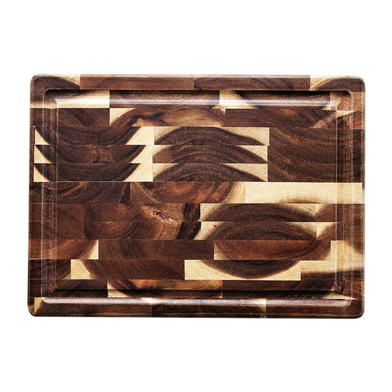 Wooden cutting board with geometric pattern on a white background