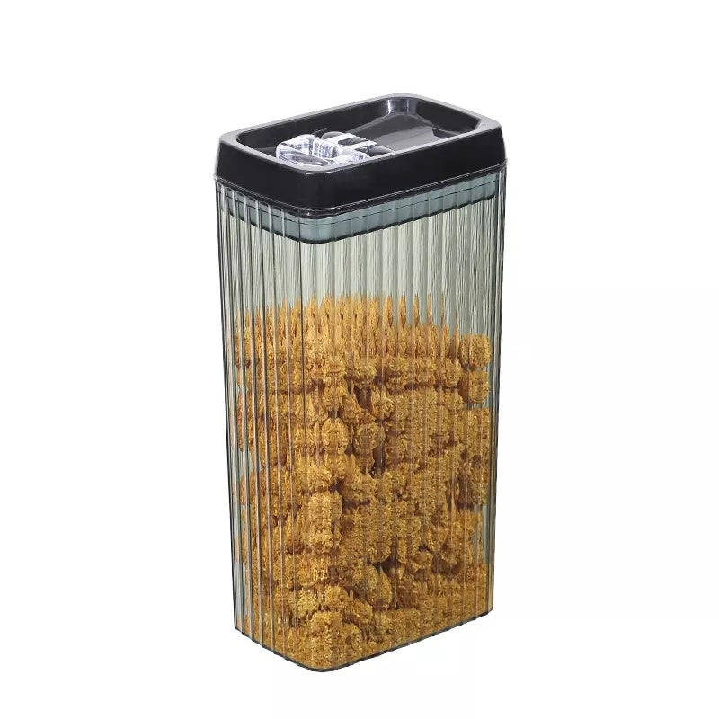 Clear container filled with wooden skewers on a white background
