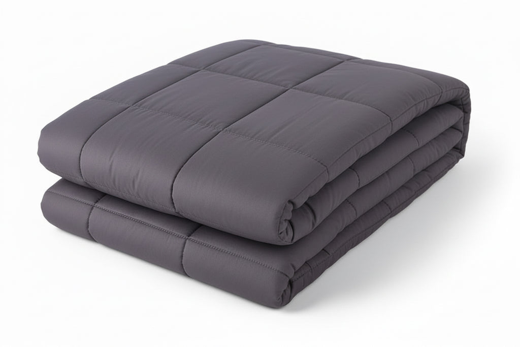 Folded gray weighted blanket on a white background