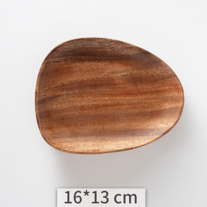 Wooden plate with dimensions 16*13 cm on a white background