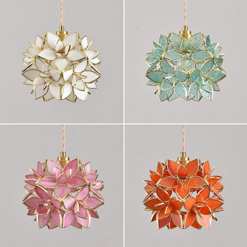 Four floral-patterned pendant lights in white, blue, pink, and orange on a gray background.