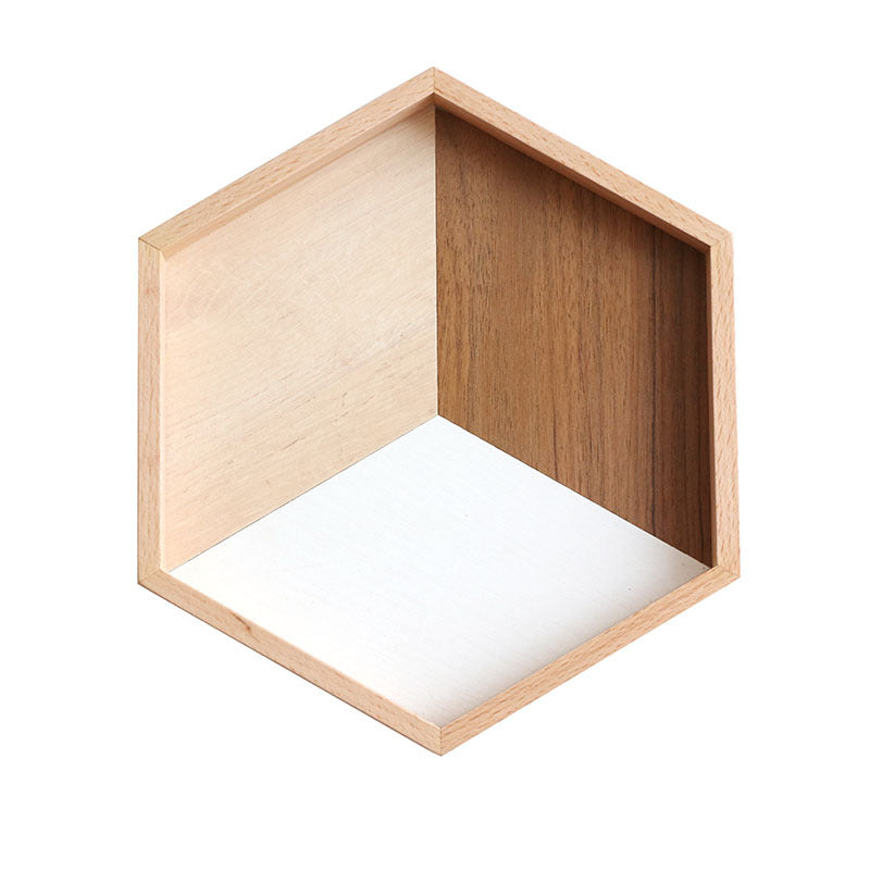 Hexagonal wooden shelf with a white interior on a white background